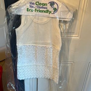 Beautiful sleeveless top. Sequins and lace. like New.